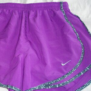 Nike Women's Dri-Fit running shorts, purple with black/white trim. Small.